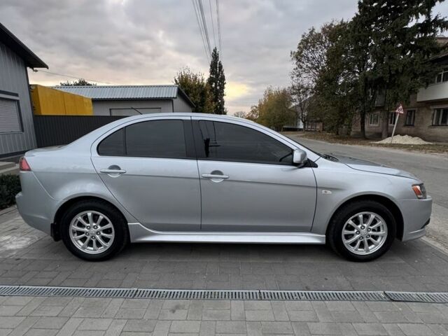 Серый Мицубиси Лансер, объемом двигателя 1.6 л и пробегом 85 тыс. км за 7400 $, фото 3 на Automoto.ua