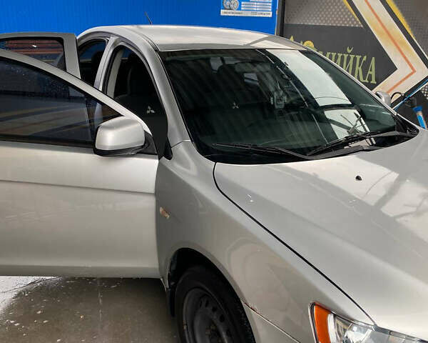 Сірий Міцубісі Lancer, об'ємом двигуна 1.6 л та пробігом 240 тис. км за 7000 $, фото 12 на Automoto.ua