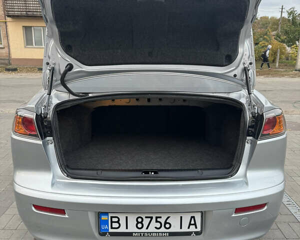 Сірий Міцубісі Lancer, об'ємом двигуна 1.6 л та пробігом 86 тис. км за 7400 $, фото 20 на Automoto.ua