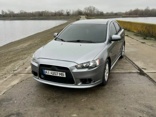Сірий Міцубісі Lancer, об'ємом двигуна 1.6 л та пробігом 200 тис. км за 6900 $, фото 7 на Automoto.ua
