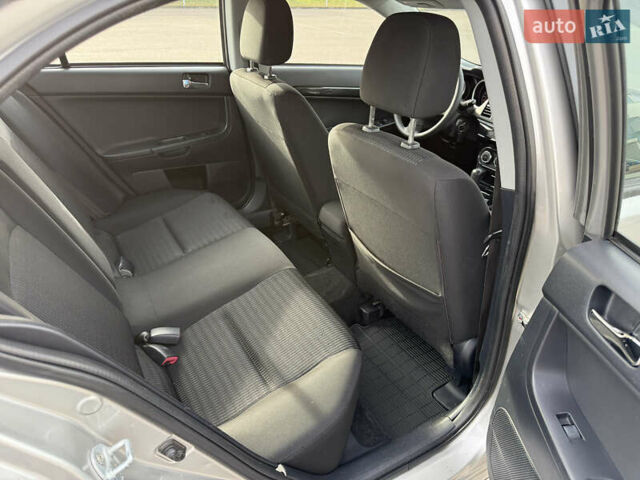 Сірий Міцубісі Lancer, об'ємом двигуна 1.6 л та пробігом 205 тис. км за 7900 $, фото 12 на Automoto.ua