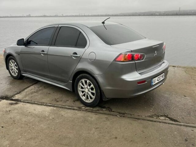 Сірий Міцубісі Lancer, об'ємом двигуна 1.6 л та пробігом 200 тис. км за 6900 $, фото 4 на Automoto.ua