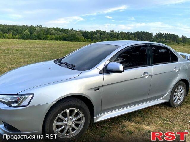 Серый Мицубиси Лансер, объемом двигателя 1.6 л и пробегом 170 тыс. км за 8300 $, фото 2 на Automoto.ua
