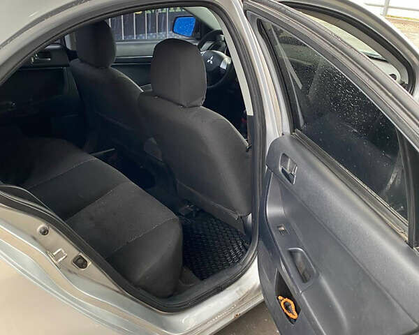Сірий Міцубісі Lancer, об'ємом двигуна 1.6 л та пробігом 240 тис. км за 7000 $, фото 10 на Automoto.ua