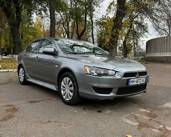 Серый Мицубиси Лансер, объемом двигателя 2 л и пробегом 170 тыс. км за 7400 $, фото 7 на Automoto.ua