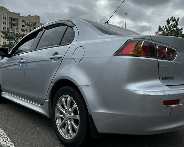 Сірий Міцубісі Lancer, об'ємом двигуна 1.6 л та пробігом 32 тис. км за 8500 $, фото 5 на Automoto.ua