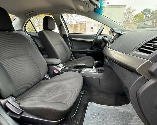 Серый Мицубиси Лансер, объемом двигателя 2 л и пробегом 170 тыс. км за 7400 $, фото 27 на Automoto.ua