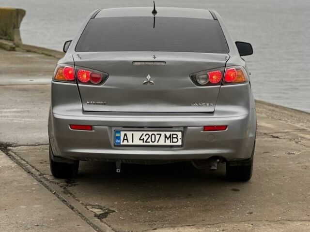 Сірий Міцубісі Lancer, об'ємом двигуна 1.6 л та пробігом 200 тис. км за 6900 $, фото 5 на Automoto.ua