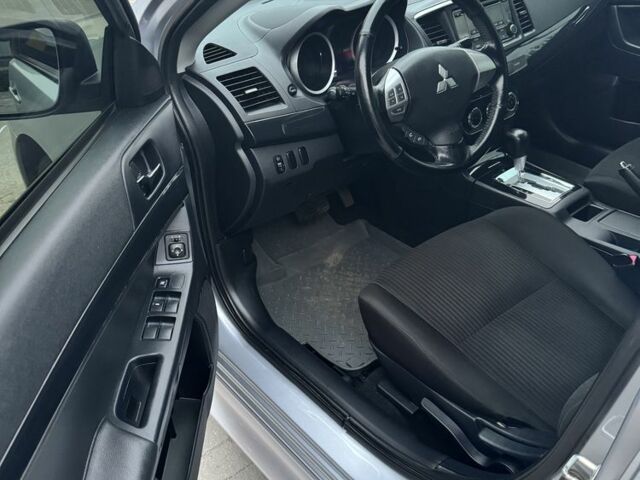 Серый Мицубиси Лансер, объемом двигателя 1.6 л и пробегом 85 тыс. км за 7400 $, фото 9 на Automoto.ua