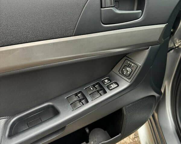 Серый Мицубиси Лансер, объемом двигателя 2 л и пробегом 170 тыс. км за 7400 $, фото 19 на Automoto.ua