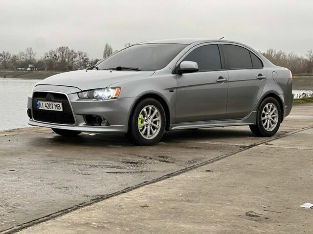 Сірий Міцубісі Lancer, об'ємом двигуна 1.6 л та пробігом 200 тис. км за 6900 $, фото 1 на Automoto.ua