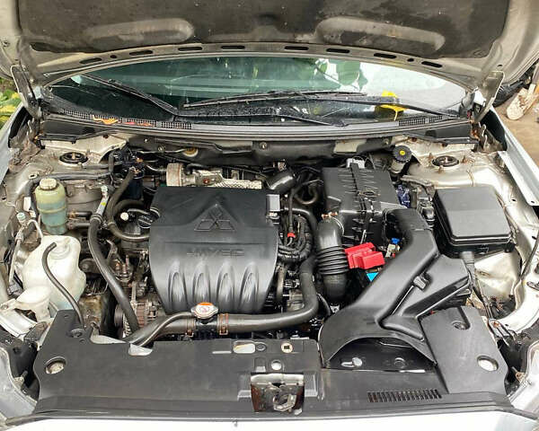 Сірий Міцубісі Lancer, об'ємом двигуна 1.6 л та пробігом 240 тис. км за 7000 $, фото 17 на Automoto.ua