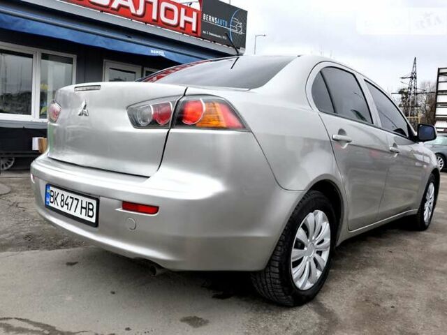 Сірий Міцубісі Lancer, об'ємом двигуна 1.6 л та пробігом 205 тис. км за 7200 $, фото 7 на Automoto.ua