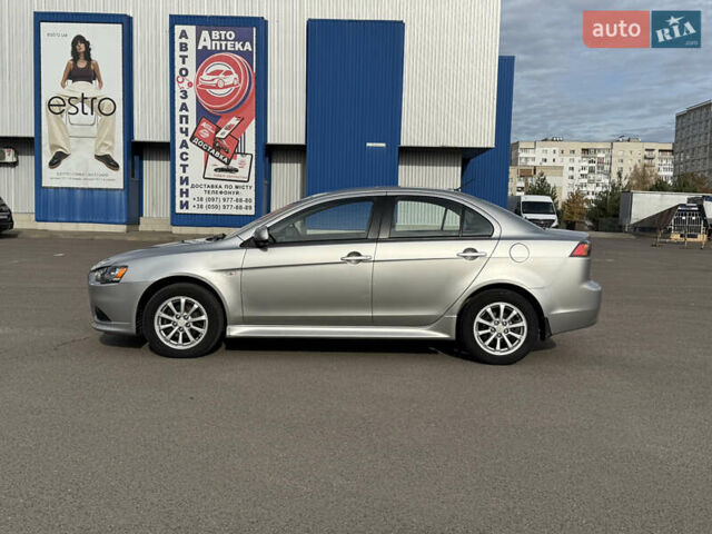 Сірий Міцубісі Lancer, об'ємом двигуна 1.6 л та пробігом 205 тис. км за 7900 $, фото 7 на Automoto.ua