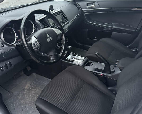 Сірий Міцубісі Lancer, об'ємом двигуна 1.6 л та пробігом 86 тис. км за 7400 $, фото 9 на Automoto.ua