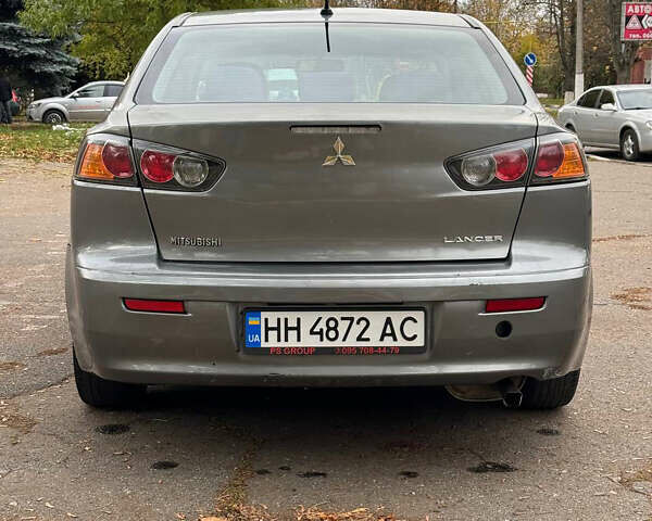 Серый Мицубиси Лансер, объемом двигателя 2 л и пробегом 170 тыс. км за 7400 $, фото 13 на Automoto.ua