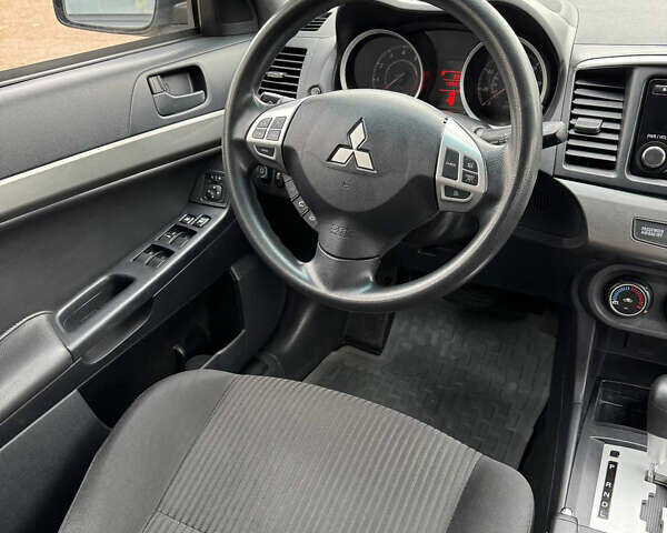 Серый Мицубиси Лансер, объемом двигателя 2 л и пробегом 170 тыс. км за 7400 $, фото 20 на Automoto.ua