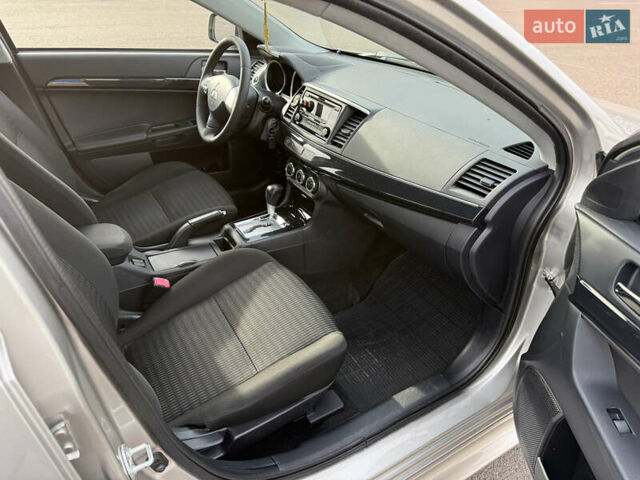 Сірий Міцубісі Lancer, об'ємом двигуна 1.6 л та пробігом 205 тис. км за 7900 $, фото 11 на Automoto.ua
