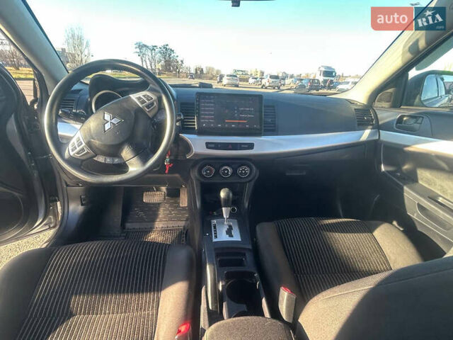 Сірий Міцубісі Lancer, об'ємом двигуна 2 л та пробігом 140 тис. км за 7800 $, фото 9 на Automoto.ua