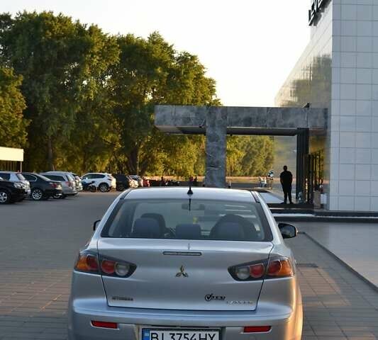 Сірий Міцубісі Lancer, об'ємом двигуна 2 л та пробігом 229 тис. км за 8500 $, фото 6 на Automoto.ua