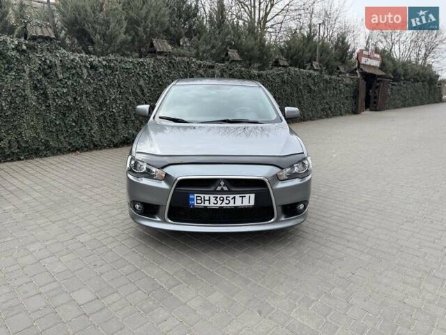 Сірий Міцубісі Lancer, об'ємом двигуна 1.6 л та пробігом 65 тис. км за 9500 $, фото 5 на Automoto.ua