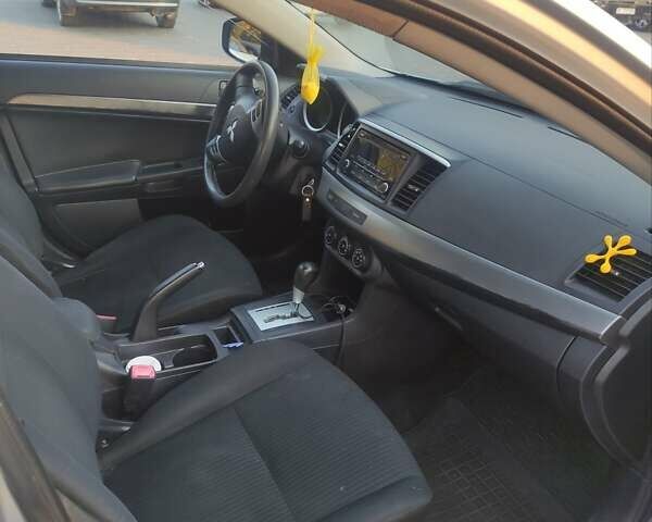 Сірий Міцубісі Lancer, об'ємом двигуна 2 л та пробігом 229 тис. км за 8500 $, фото 2 на Automoto.ua