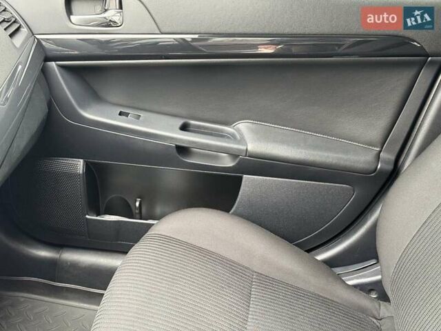 Сірий Міцубісі Lancer, об'ємом двигуна 1.6 л та пробігом 65 тис. км за 9500 $, фото 10 на Automoto.ua