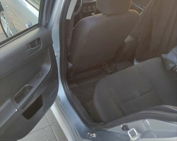 Сірий Міцубісі Lancer, об'ємом двигуна 2 л та пробігом 229 тис. км за 8500 $, фото 4 на Automoto.ua