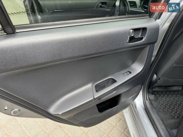 Сірий Міцубісі Lancer, об'ємом двигуна 1.6 л та пробігом 65 тис. км за 9500 $, фото 9 на Automoto.ua