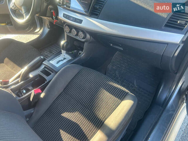 Сірий Міцубісі Lancer, об'ємом двигуна 2 л та пробігом 140 тис. км за 7800 $, фото 11 на Automoto.ua