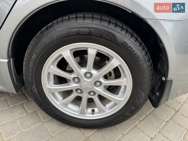 Сірий Міцубісі Lancer, об'ємом двигуна 1.6 л та пробігом 65 тис. км за 9500 $, фото 11 на Automoto.ua