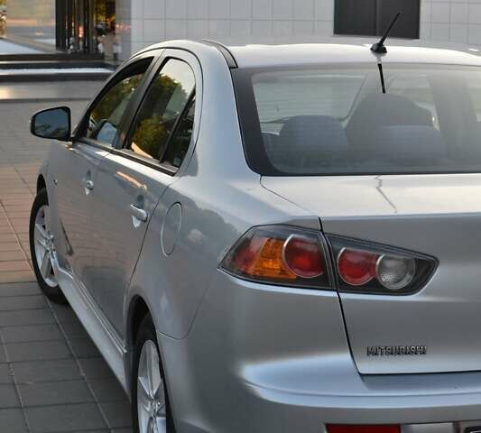 Сірий Міцубісі Lancer, об'ємом двигуна 2 л та пробігом 229 тис. км за 8500 $, фото 3 на Automoto.ua