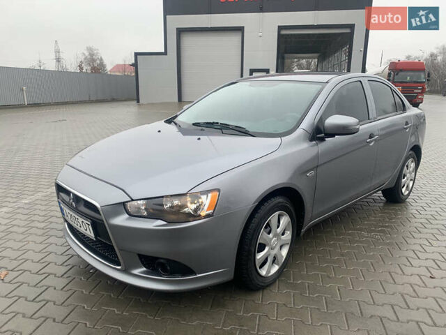 Серый Мицубиси Лансер, объемом двигателя 1.59 л и пробегом 83 тыс. км за 9900 $, фото 7 на Automoto.ua
