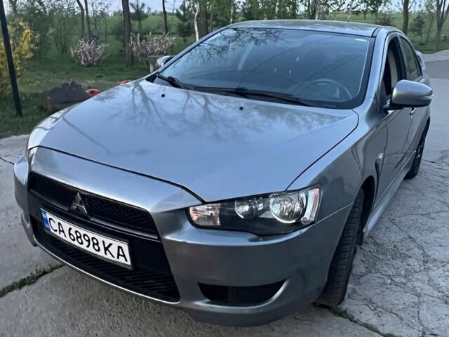 Сірий Міцубісі Lancer, об'ємом двигуна 2 л та пробігом 127 тис. км за 8500 $, фото 4 на Automoto.ua