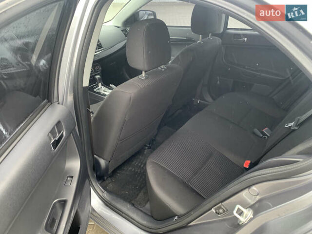 Серый Мицубиси Лансер, объемом двигателя 1.59 л и пробегом 83 тыс. км за 9900 $, фото 30 на Automoto.ua