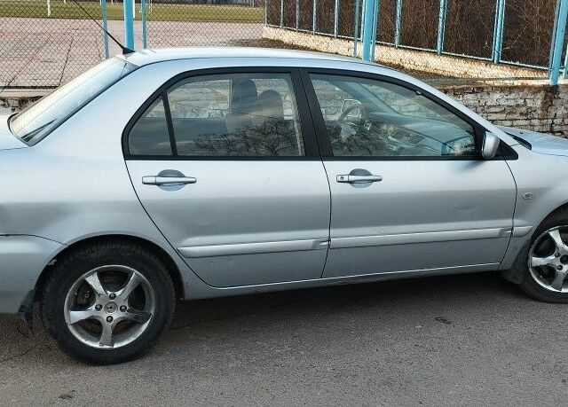 Сірий Міцубісі Lancer, об'ємом двигуна 0 л та пробігом 214 тис. км за 3200 $, фото 5 на Automoto.ua