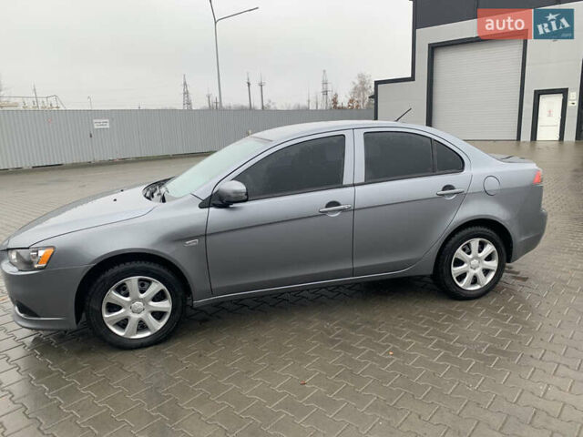 Серый Мицубиси Лансер, объемом двигателя 1.59 л и пробегом 83 тыс. км за 9900 $, фото 19 на Automoto.ua