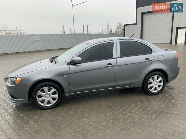 Серый Мицубиси Лансер, объемом двигателя 1.59 л и пробегом 83 тыс. км за 9900 $, фото 20 на Automoto.ua