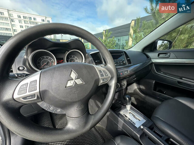 Серый Мицубиси Лансер, объемом двигателя 2 л и пробегом 189 тыс. км за 7900 $, фото 11 на Automoto.ua