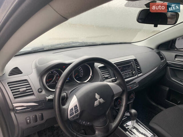 Серый Мицубиси Лансер, объемом двигателя 1.59 л и пробегом 83 тыс. км за 9900 $, фото 34 на Automoto.ua