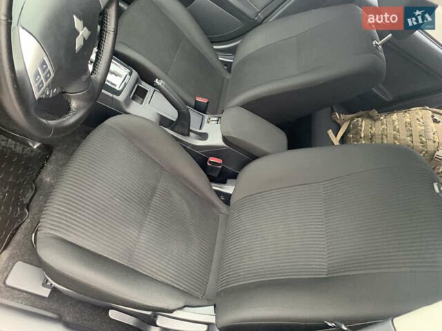 Серый Мицубиси Лансер, объемом двигателя 1.59 л и пробегом 83 тыс. км за 9900 $, фото 23 на Automoto.ua
