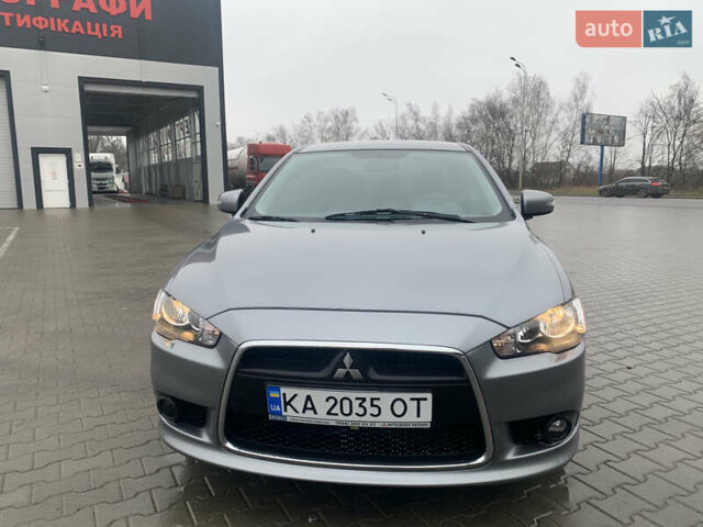 Серый Мицубиси Лансер, объемом двигателя 1.59 л и пробегом 83 тыс. км за 9900 $, фото 5 на Automoto.ua