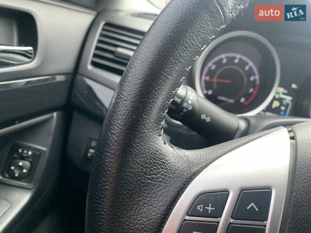 Серый Мицубиси Лансер, объемом двигателя 1.59 л и пробегом 83 тыс. км за 9900 $, фото 37 на Automoto.ua