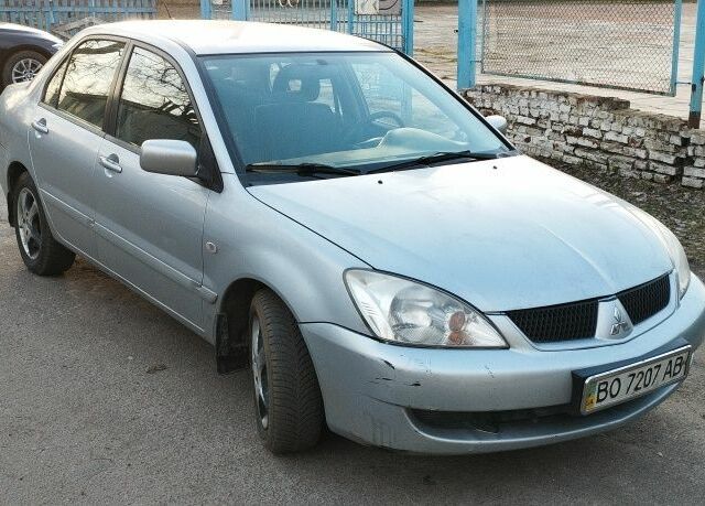 Сірий Міцубісі Lancer, об'ємом двигуна 0 л та пробігом 214 тис. км за 3200 $, фото 4 на Automoto.ua