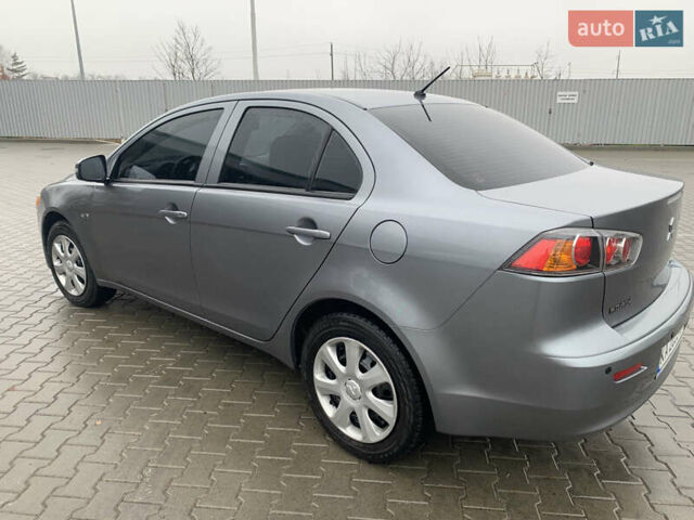 Серый Мицубиси Лансер, объемом двигателя 1.59 л и пробегом 83 тыс. км за 9900 $, фото 14 на Automoto.ua