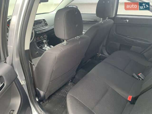 Серый Мицубиси Лансер, объемом двигателя 1.59 л и пробегом 83 тыс. км за 9900 $, фото 29 на Automoto.ua