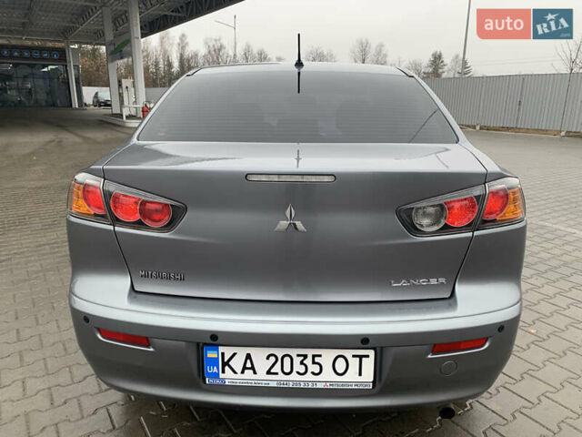 Серый Мицубиси Лансер, объемом двигателя 1.59 л и пробегом 83 тыс. км за 9900 $, фото 12 на Automoto.ua