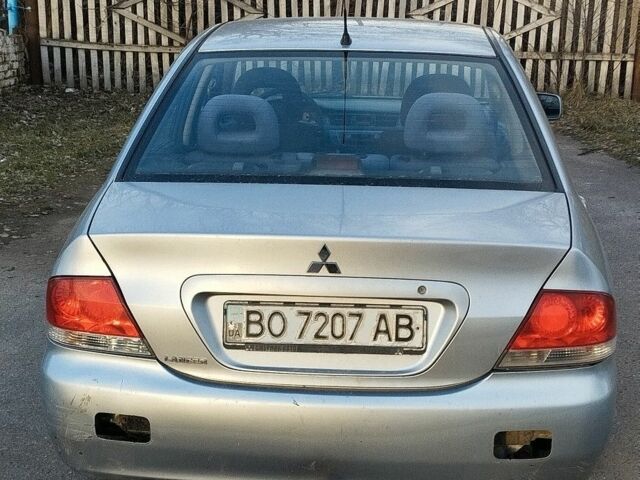 Сірий Міцубісі Lancer, об'ємом двигуна 0 л та пробігом 214 тис. км за 3200 $, фото 2 на Automoto.ua