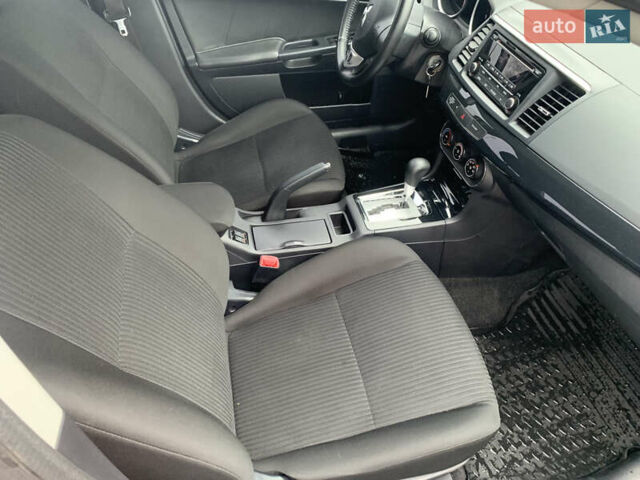 Серый Мицубиси Лансер, объемом двигателя 1.59 л и пробегом 83 тыс. км за 9900 $, фото 4 на Automoto.ua
