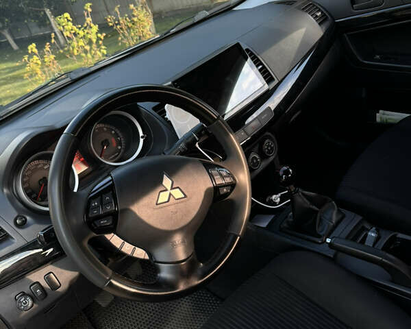 Серый Мицубиси Лансер, объемом двигателя 2 л и пробегом 95 тыс. км за 8300 $, фото 22 на Automoto.ua